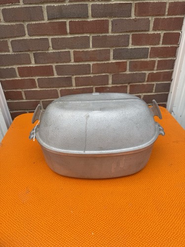 Vtg cast aluminum oval - cast,
